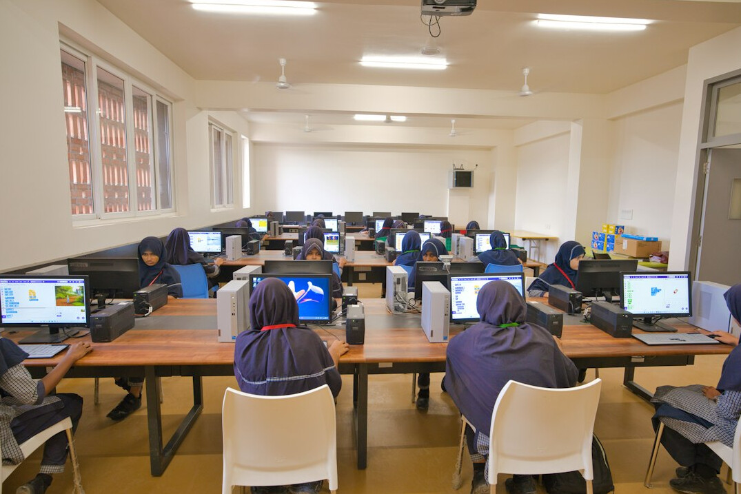 japanese students coding together